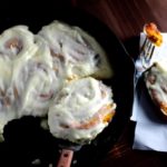 Pumpkin Cinnamon Rolls with Orange Cream Cheese Frosting